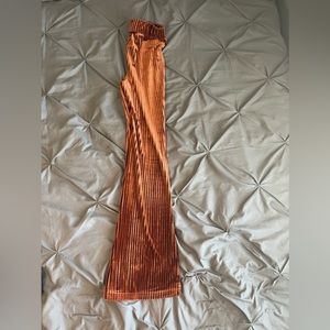 Orange flared velvet pants
